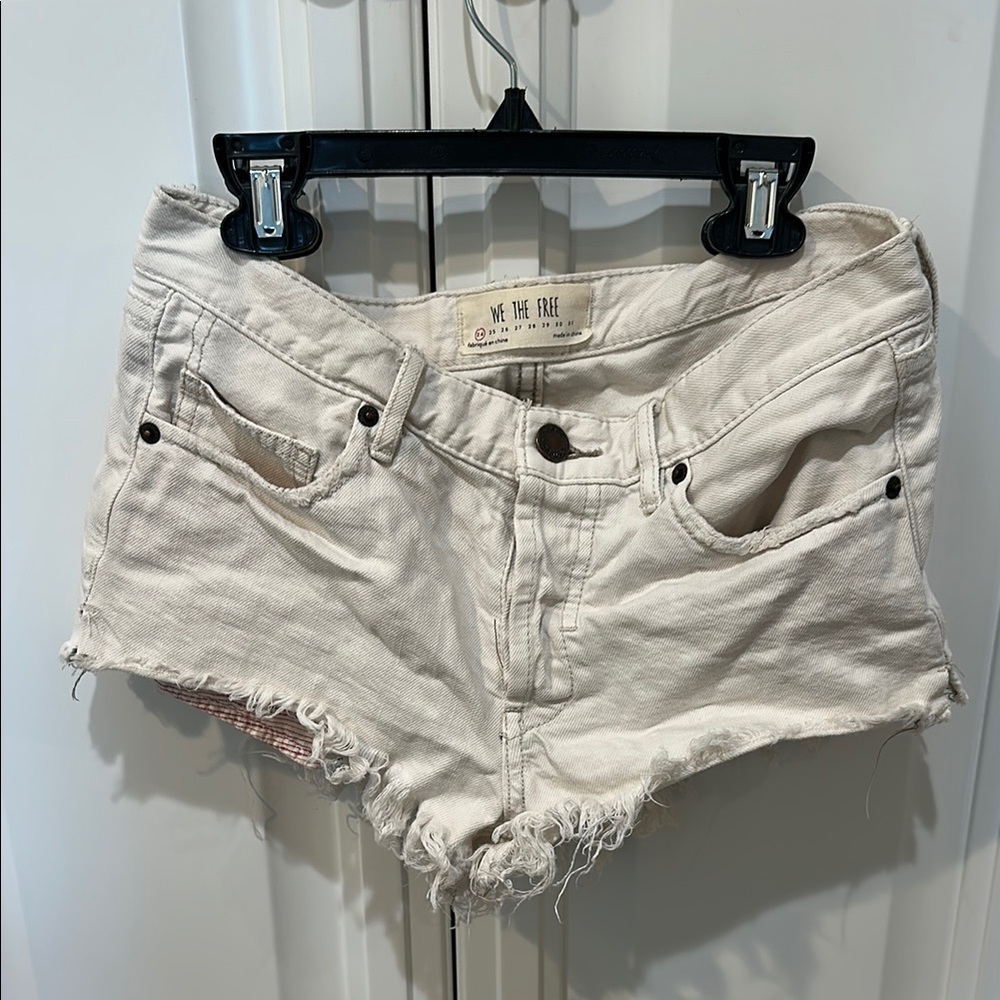 We The Free Cream Distressed Jean Shorts Raw Hem
